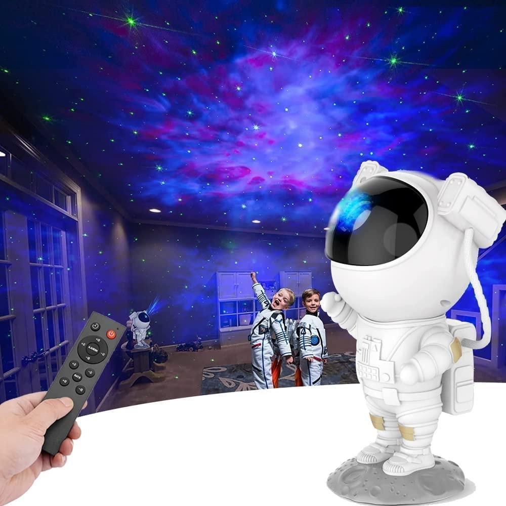 Children enjoying a 360 degree star light projector creating colorful galaxy and stars in a room with astronaut design