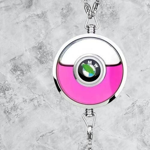 Livingdot auto air freshener pendant with pink liquid and silver casing hanging on a chain