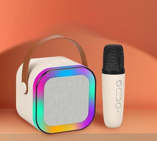 Livingdot Bluetooth microphone speaker with colorful front panel and white wireless microphone
