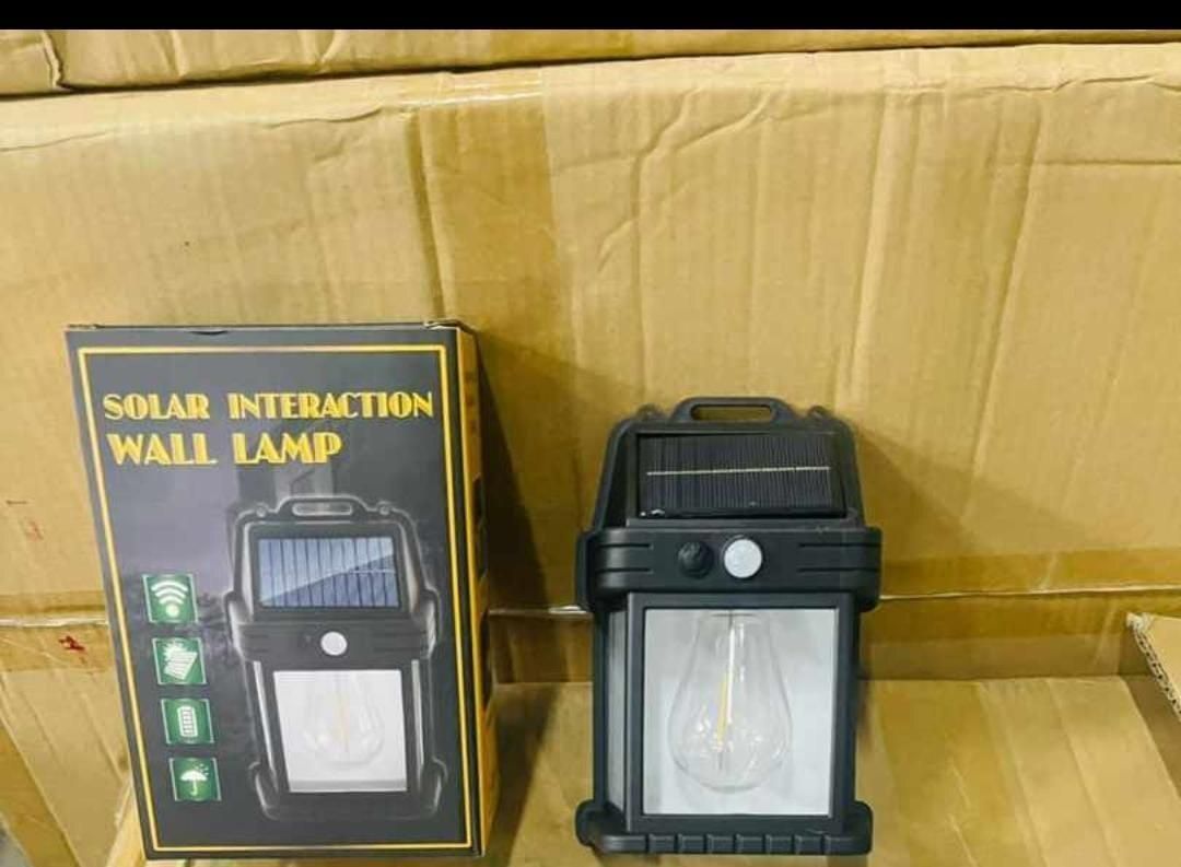 Solar interaction wall lamp with solar panel illustrating energy-efficient garden lighting for outdoor use