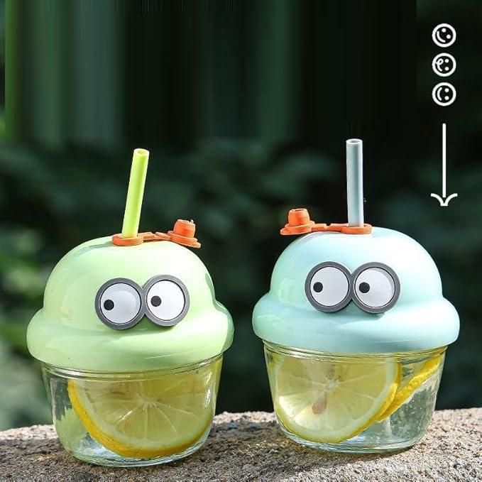 Livingdot funny glass cups for children with cartoon eye lids and colorful straws holding lemon water