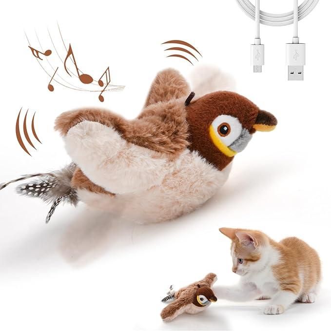 Realistic motion cat toy shaped like a bird with USB charging cable and playful kitten nearby