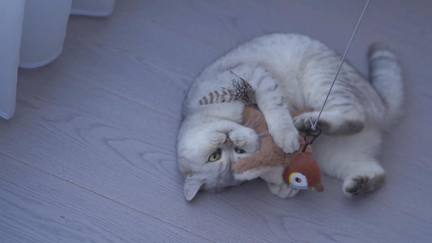 Cat playing with a realistic motion cat toy designed to engage and entertain pets indoors