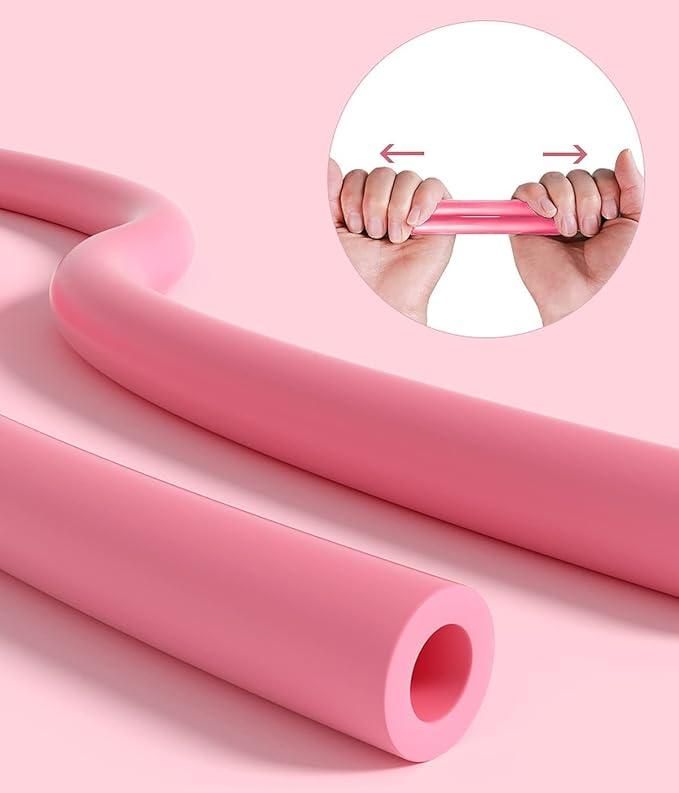 Livingdot pink resistance bands for home gym shown close up with hands stretching band