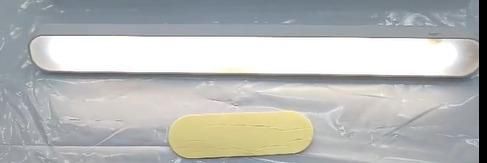Livingdot USB rechargeable LED light with sleek design and adhesive mounting strip for easy installation