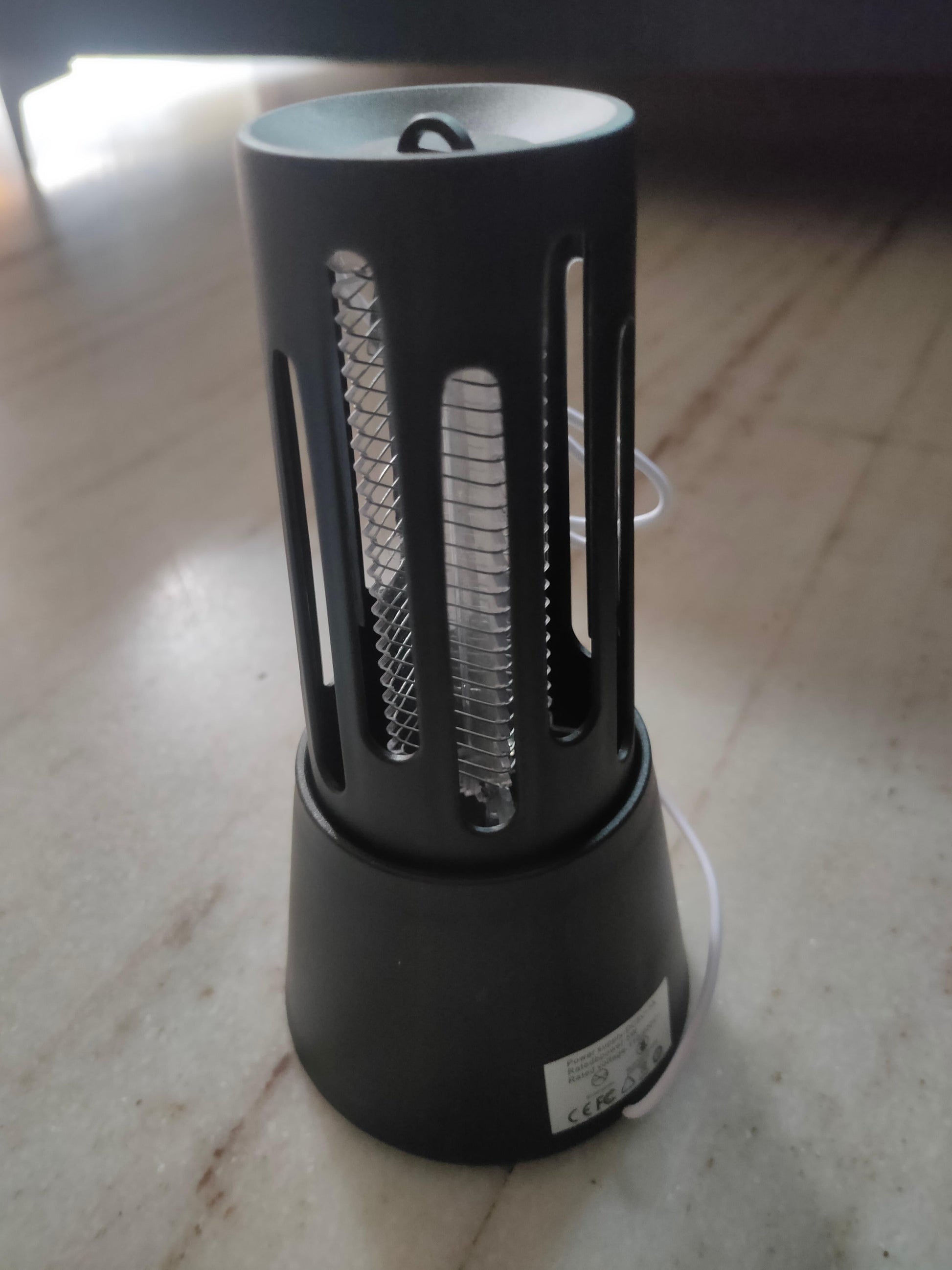 Livingdot electric mosquito killer lamp in black with cylindrical design and protective grid