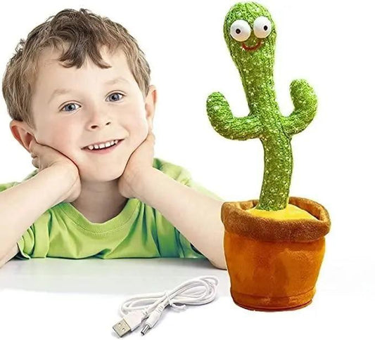 LED cactus toy with smiling face and USB cable next to happy young boy in green shirt